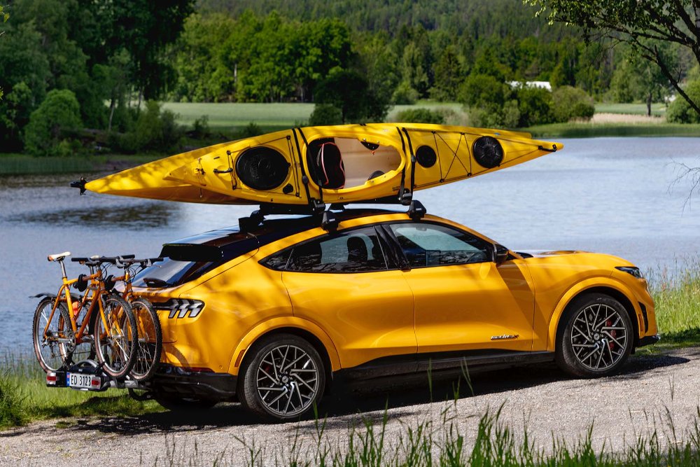 Yellow Mach-E with canoe